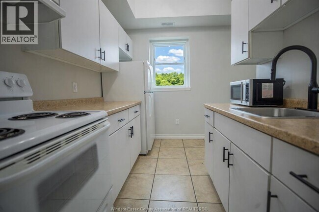 Photo - 416 Lincoln Rd Unité 1