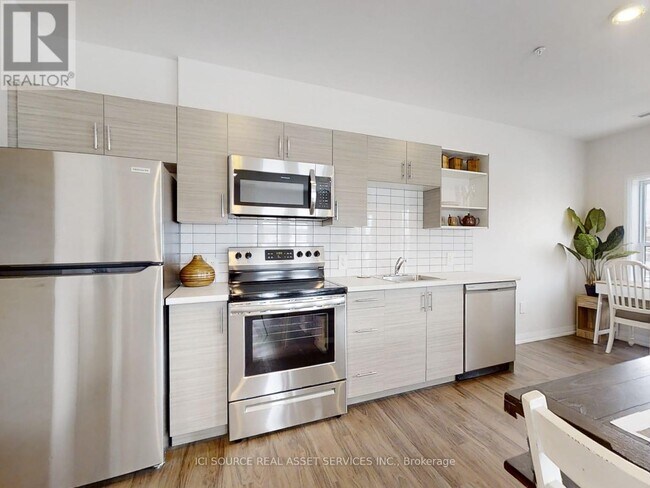 Photo - 77 William St N Unité 208