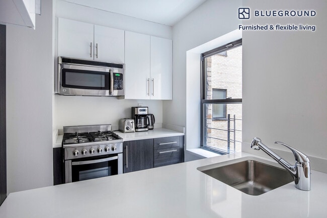 Photo - 360 W 34th St. Unidad SI FL8-ID1309