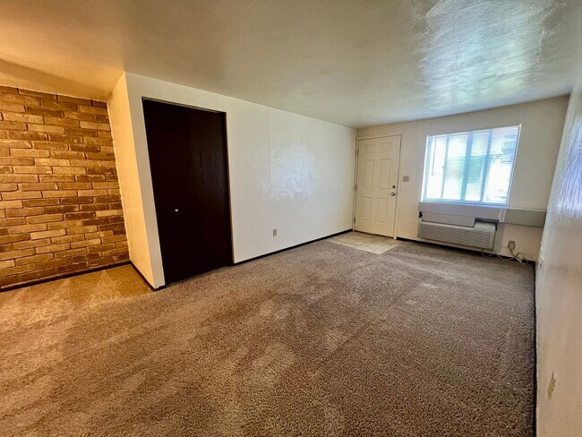 Photo - Cozy One Bedroom Apartment! Exposed Brick throughout & Laundry On-Site! Call Today! Unit 304