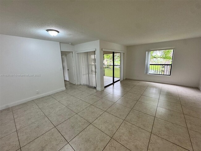 Photo - 3817 Cocoplum Cir Unit 3585