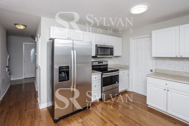 Photo - Enjoy Relaxation & Sophistication in this lovely 3 bedroom, 2.5 bath home.