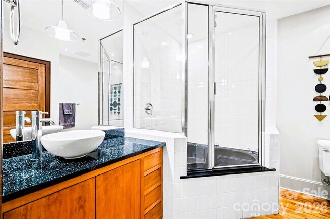 Photo - Turn-Key Downtown Asheville Condo | Historic Old Penney’s Building | Rooftop Views