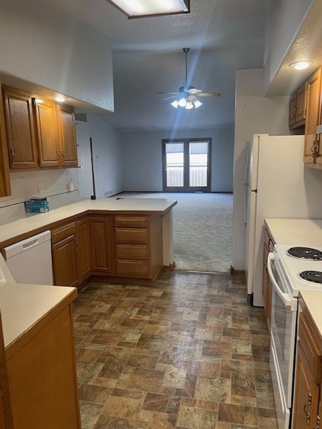 Photo - Spacious 3 Bed 3 Bath Townhome with Finished Basement & 2-Car Garage