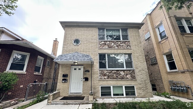 Building Photo - 5407 N Sawyer Ave Unit G Rental
