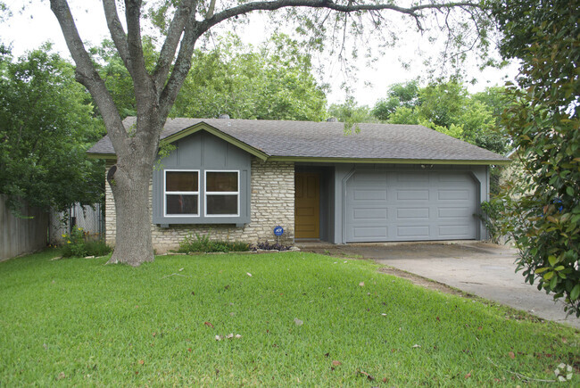 Building Photo - Introducing a charming single-family home ...