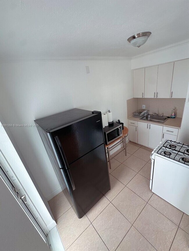 Photo - 7445 Harding Ave Unit 213