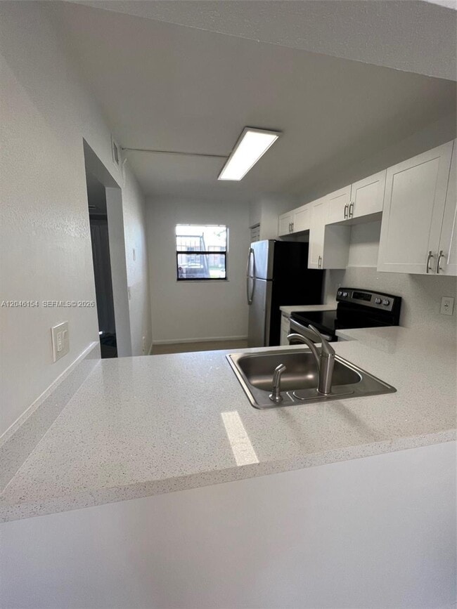 Photo - 852 NE 209th St Unit 104-38