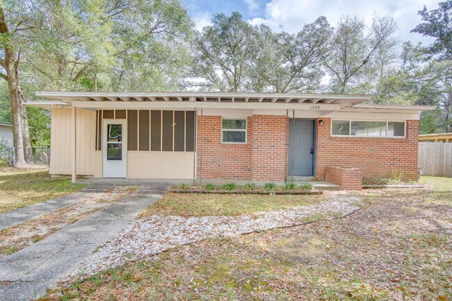 Photo - Updated 3-Bedroom, 2-Bath Ranch with Fenced Backyard, Carport, and Modern Kitchen