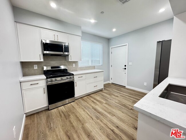 Photo - 5637 Homeside Ave Unidad 5637 3/4