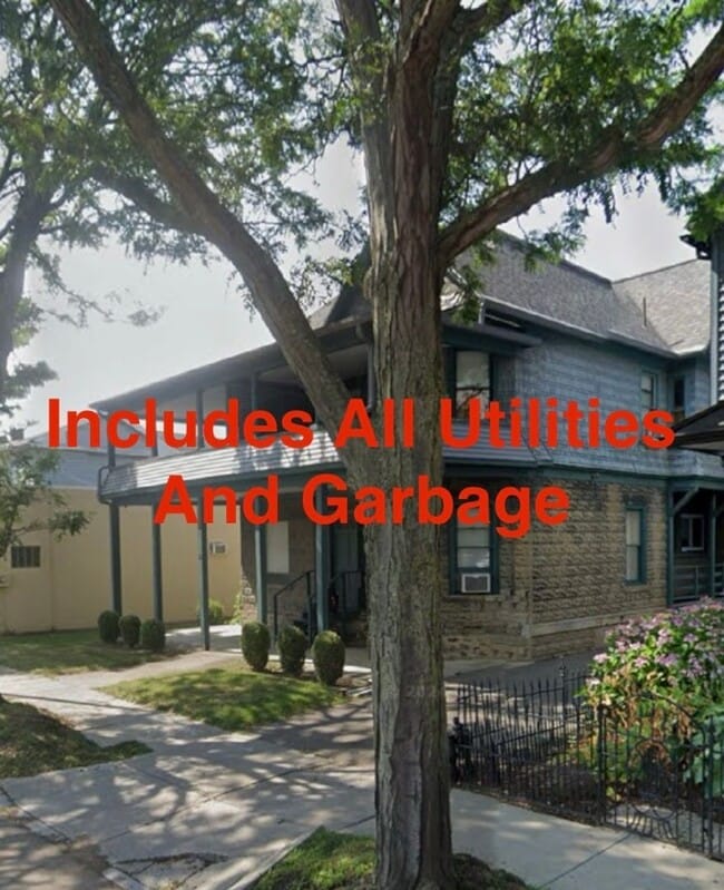 Building Photo - *NO PET DOGS* Upper 1 bedroom all Utilities included Unit 2 Bed - Front Building - Upper Left