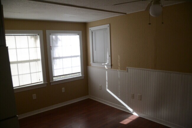 living room area and bathroom to the left.