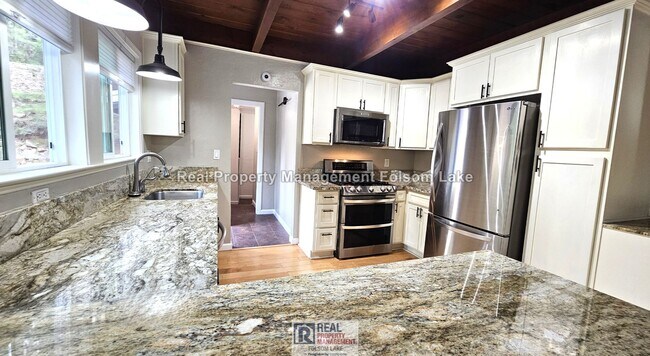 Photo - Private Wooded Retreat on 2 Acres – 4BR 2Bath Home with Space for Animals, Fruit Trees & Seasonal...