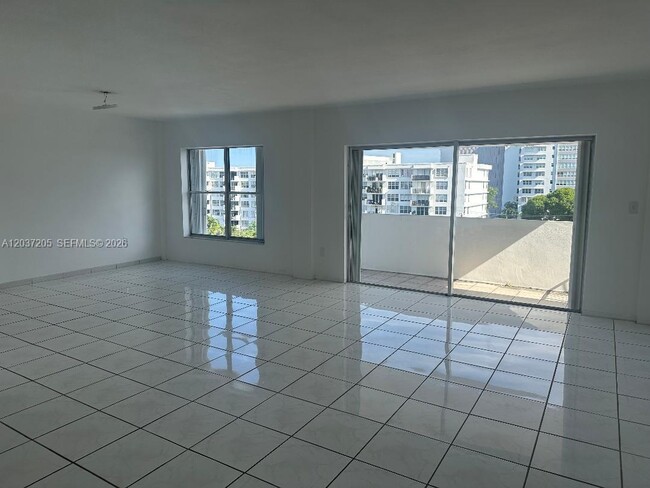 Building Photo - 1075 92nd St Unit 603