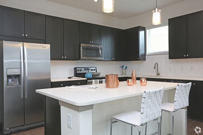 Building Photo - Move In & Save Big – Up to $1,000 Off Unit 88T Rental