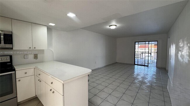 Building Photo - 5530 W 26th Ct Unit 104