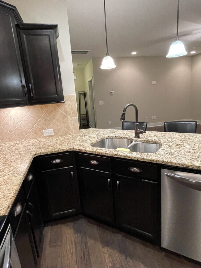 1 car garage with 2 additional back parking spaces - 1632 Shadow Green Dr