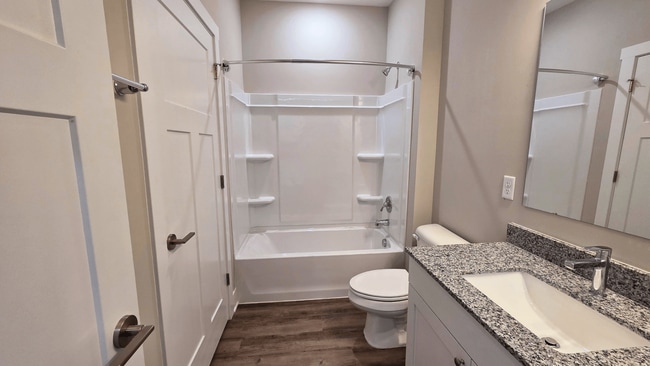 A bathroom of an available apartment at Greenwood Commons Apartments in Delaware, OH. - Greenwood Commons Apartments