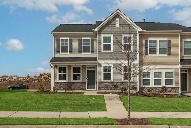 Building Photo - Spacious End-Unit 4-Bedroom Townhome