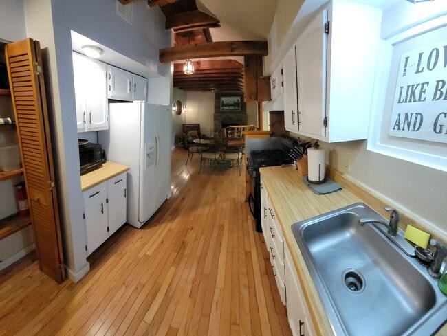 Photo - Spacious 4 Bedroom, 2 Bath One-Story Home with Hardwood Floors & Parking