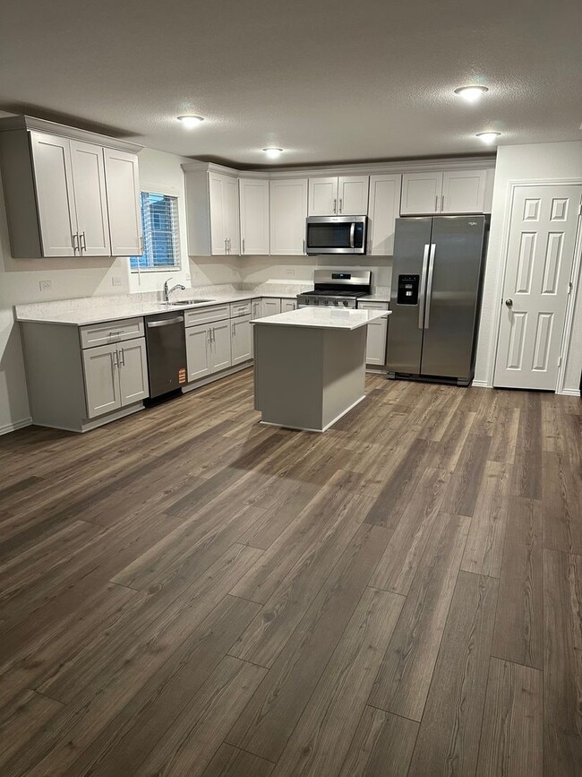 Photo - Brand New 4BR 3BA Home w/ Quartz Kitchen • 2-Car Garage • Fenced Yard in Elizabeth Creek