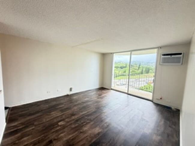 Building Photo - Welcome to your new home at Pearlridge Gardens & Tower! This 1-bedroom, 1-bathroom condo $2,100 Unit 7-1207