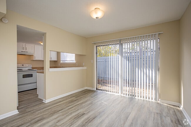 3BR, 2BA Townhouse - 1,100SF - Dining Room - Forestwood Apartments