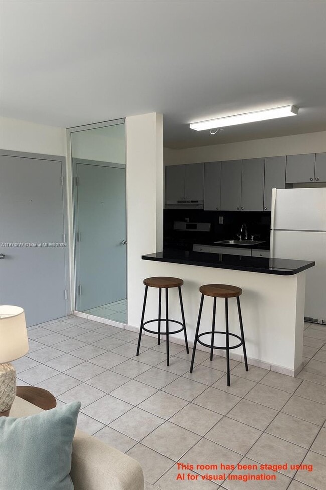 Photo - 465 S Royal Poinciana Blvd Unit 1B