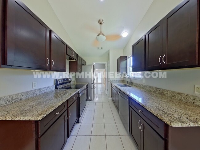 Photo - Charming & Updated 3BR/2BA plus Flex Room with Massive Privacy-Fenced Backyard