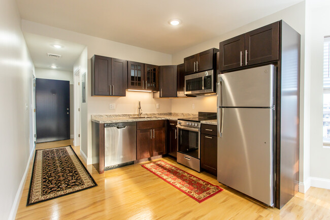 Deluxe - Kitchen - Secure Access - Furnished - All Included Apartments