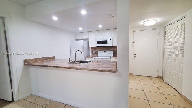 Photo - 8160 Geneva Ct Unit 104