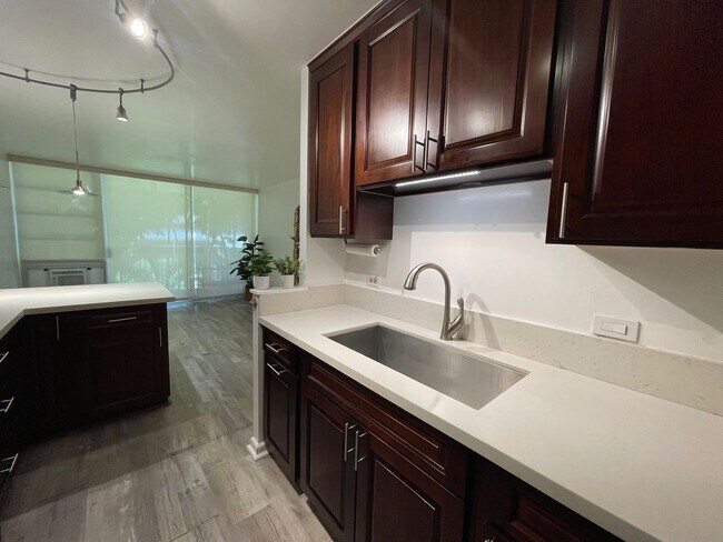 Photo - Partly Furnished 2-bedroom, 2-bath condo a... Unit 206