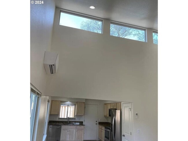 Photo - Bright and Airy Home with Stainless Steel Kitchen, Vaulted Ceilings & Washer + Dryer Unit #1436