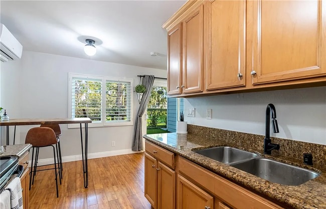 Building Photo - Executive Bixby Village condo with gorgeou... Unit #9