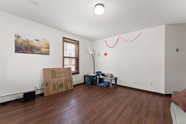 Living room - 3101 E 24th St Unit 1