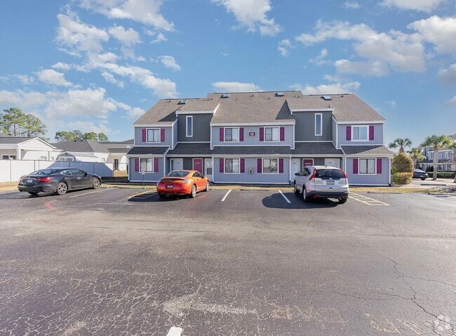 Building Photo - Fully furnished condo minutes from the beach!