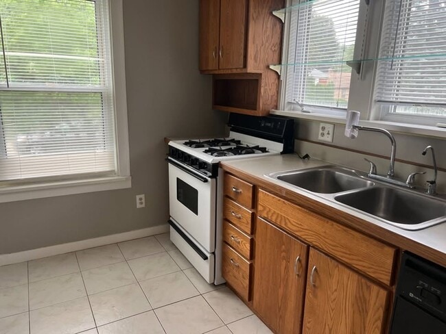 Photo - Charming 3-Bedroom, 1.5-Bath Single-Family Home with Bonus Living Space