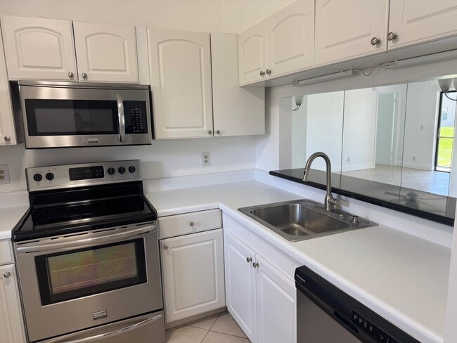 Photo - 6772 Palmetto Cir S Unit 104