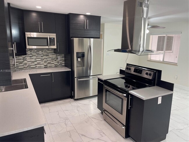 Building Photo - 2971 SW 35th Ave Unit Front