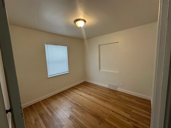 Photo - Spacious 4 Bedroom Home | 2 Living Rooms | Large Fenced Yard | 1,700+ Sq Ft