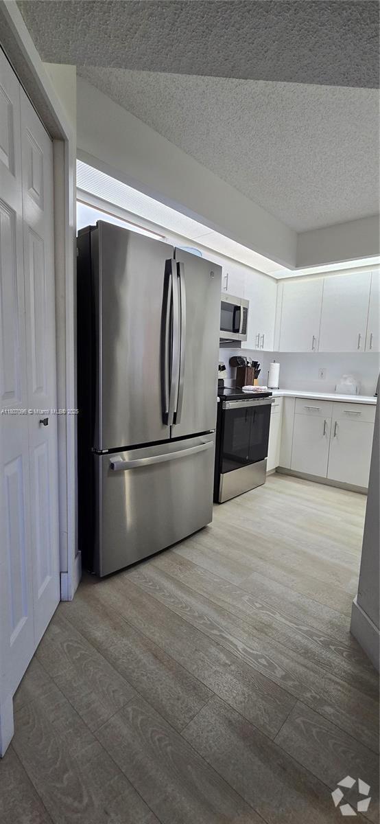 Building Photo - 12551 SW 16th Ct Unit 311c Rental