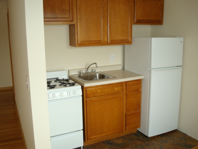 Updated Kitchen - 4150 Regent Ave N Apartments