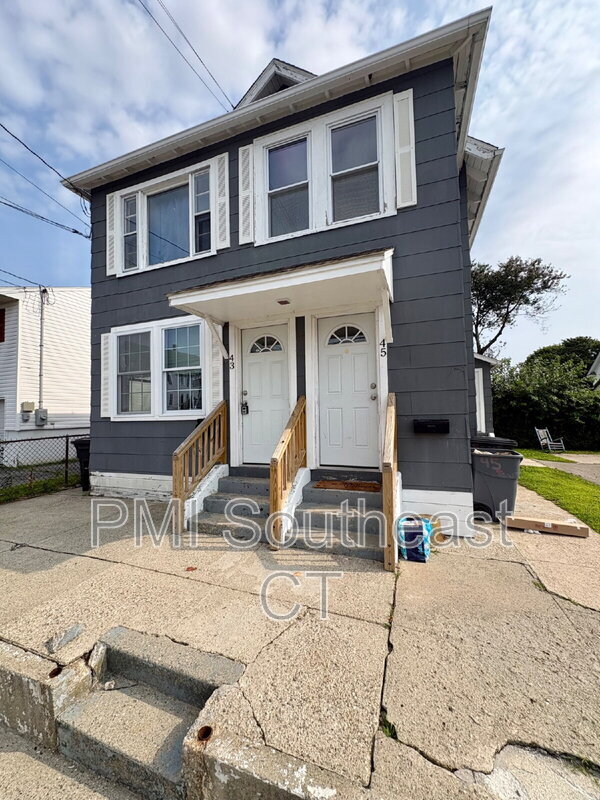 Building Photo - 43-45 Denison Ave Unit 43