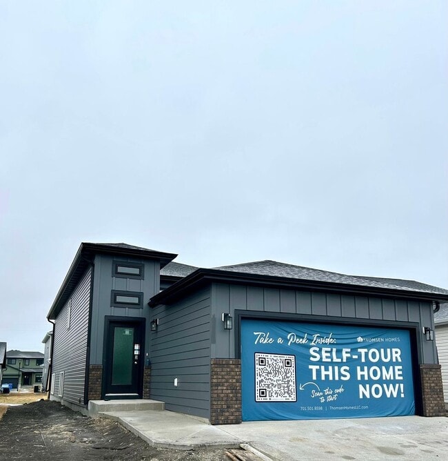 Building Photo - Spacious & Stylish 4-Bed Home with Modern Finishes and Attached 2-Stall Garage