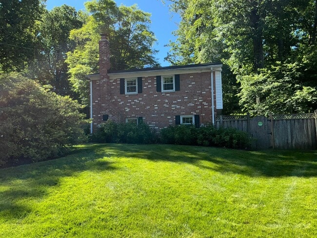 Photo - Very well maintained 4BR 2.5BA 4-level split 2 car attached garage and fully fenced yard