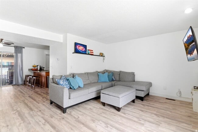 Photo - "Spacious 3-Bed Oasis with Fireplace & Modern Vinyl Touches in Ogden"