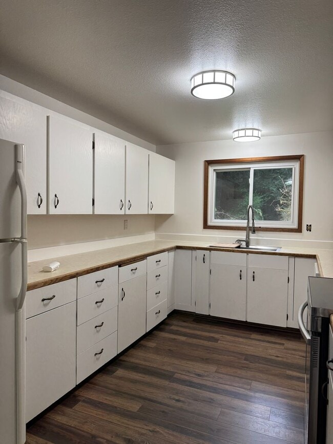 Photo - Cozy one story home on beautiful close to town acreage.