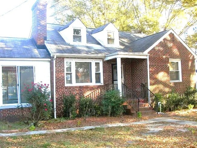 Building Photo - Four bedroom - Brick Cape Cod