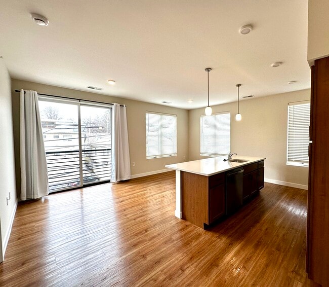 Kitchen & Living Rm w/ Balcony - The Downtown on Grant