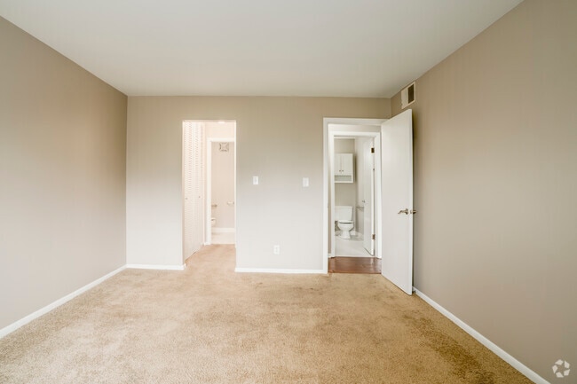 2BR, 1.5BA - 1,050SF - Primary Bedroom